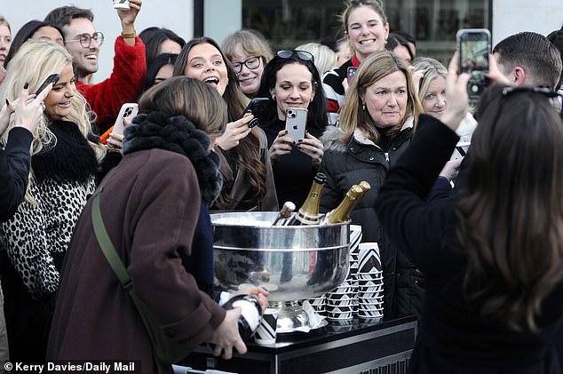 Champagne all around!  The staff wheeled out an ice bucket full of bubbles to enjoy on their last day of work at Vogue House