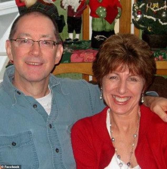 Justin Mohn's father, Michael, and his mother, Denice.  Michael was found decapitated in a bathroom at the family home on Tuesday