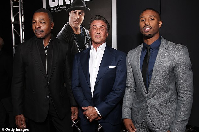 Weathers is pictured with Stallone and Michael B. Jordan at the premiere of Rocky spin-off Creed in 2015 - Jordan played Adonis Creed, the secret son of Apollo