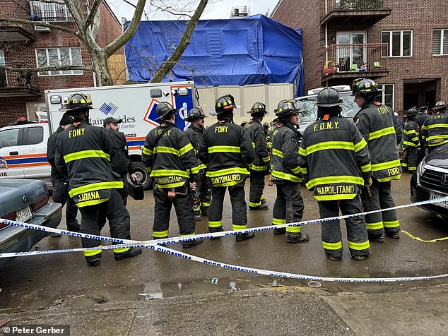 Images show dozens of emergency workers outside the building responding to the tragic incident