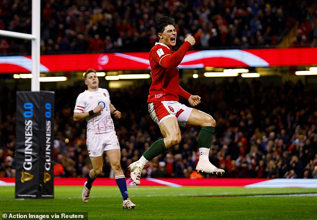 Wales winger Louis Rees-Zammit, who now has decent rugby for the NFL, celebrates in front of a packed Welsh crowd