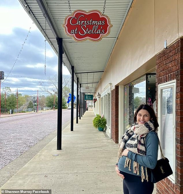 The CDC reported that an estimated 1,660 people are born with this heart condition each year in the US.  Murray is seen hugging her baby bump under a sign with her future daughter's name on it