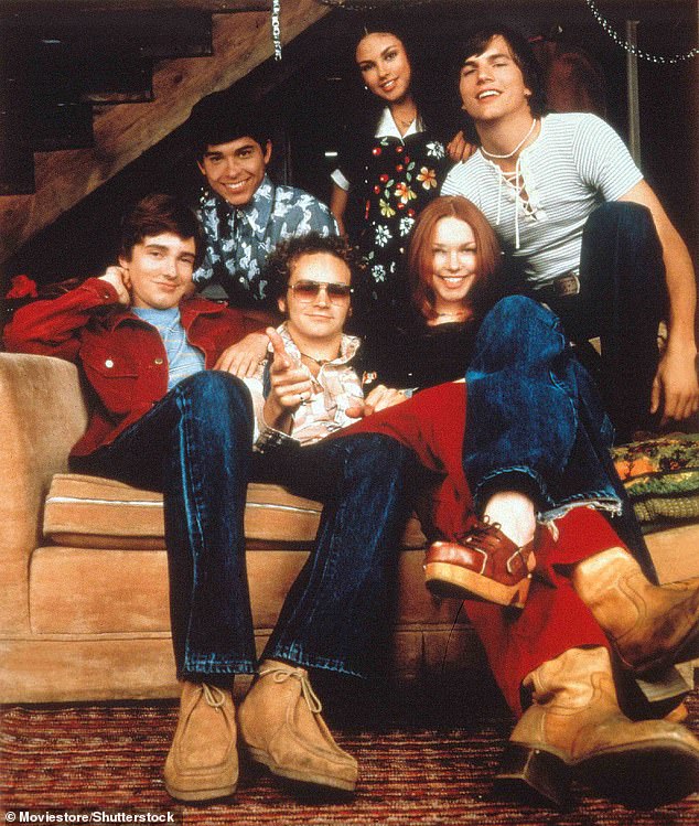 Danny pictured with his That 70's Show co-stars Topher Grace, Wilmer Valderama, Mila Kunis, Laura Prepon and Ashton Kutcher