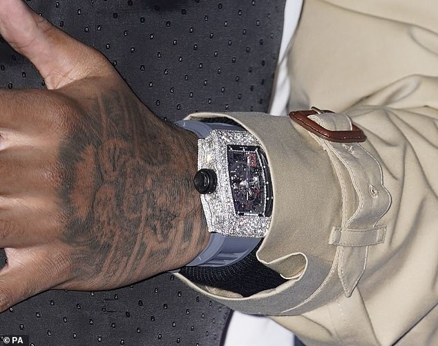 Marcus Rashford wears a diamond-encrusted Richard Mille RM011 at a movie premiere