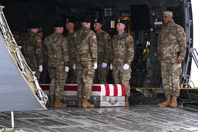 The bodies of three slain American soldiers were returned to Dover Air Force Base in Delaware