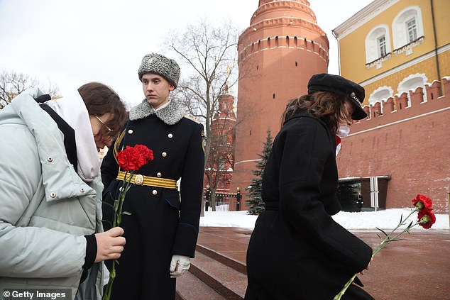 Dozens gathered to lay flowers on the grave of the Unknown Soldier near the Kremlin wall, on the 500th day since Vladimir Putin ordered the partial mobilization of up to 300,000 reservists