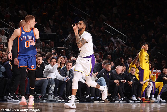 D'Angelo Russell #1 of the Los Angeles Lakers celebrates a three-point basket during the game