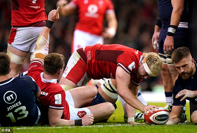 Wales scored 26 unanswered points after trailing 27–0 early in the second half, with Man of the Match Aaron Wainwright (centre) scoring his side's third try