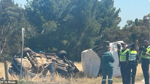 The Ford sedan Ms Glasson was driving struck both sides of the bus before both vehicles rolled (photo, emergency services on scene)