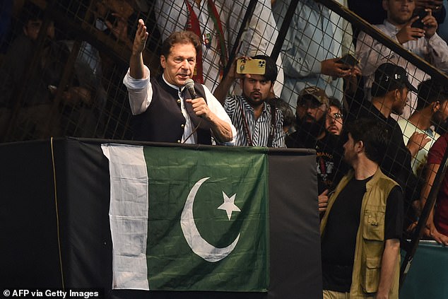 Khan delivers a speech to his supporters during a rally to mark the 75th anniversary of Pakistan's Independence Day in Lahore on August 13, 2022