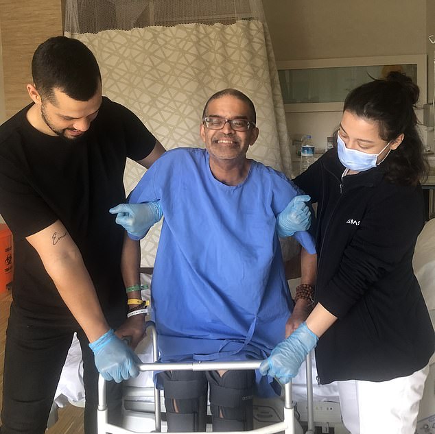 Mr. Chary (center) after arriving in Bodrum, Turkey.  He was very weak and could not get up without help