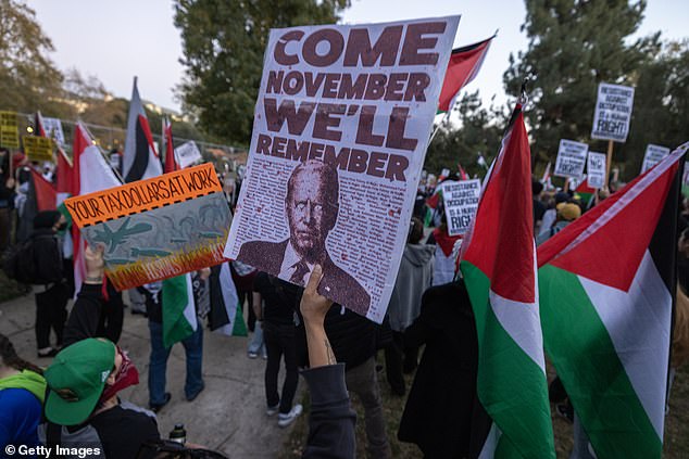 Biden was chased by protesters during his campaign stops, including some during his last visit to Los Angeles in December (above)