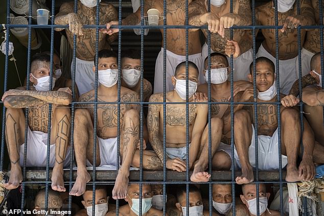 Members of the MS-13 and 18 gangs remain in an overcrowded cell at the Quezaltepeque Prison in Quezaltepeque, El Salvador