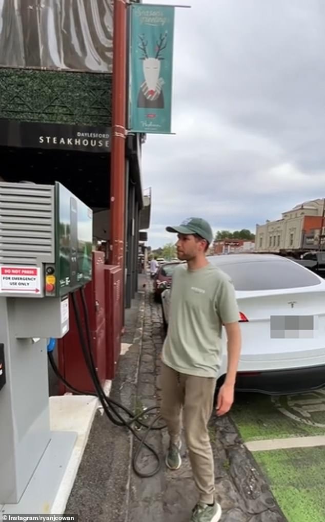 Mr Cowan has gained a following on social media for his videos showing the benefits of owning an electric car, but also the challenges - including charging ports that refuse to work (pictured) and the impracticality of towing a caravan.