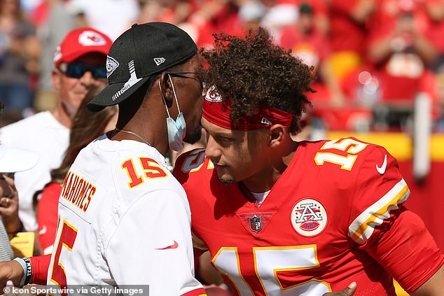 Kansas City Chiefs quarterback Patrick Mahomes hugs his father before an AFC West game between the Los Angeles Chargers and Kansas City Chiefs in September 2021