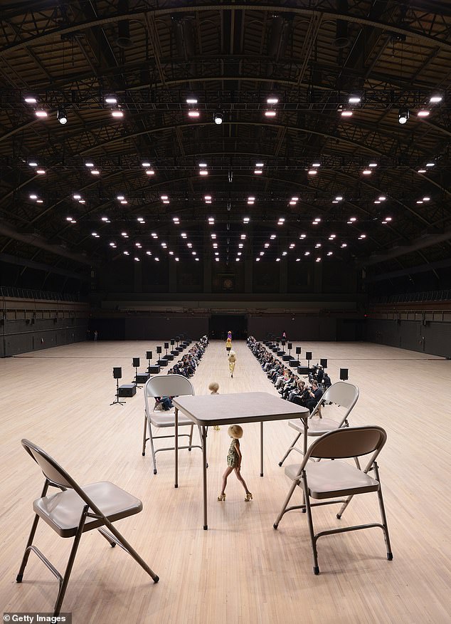 Jacobs transformed the cavernous 'catwalk' in their home with artwork by artist Robert Therrien, featuring an elephant table with four giant folding chairs