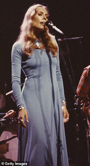 Before bringing her on stage, Brandi drew attention to the many struggles Joni (seen in 1974) has faced