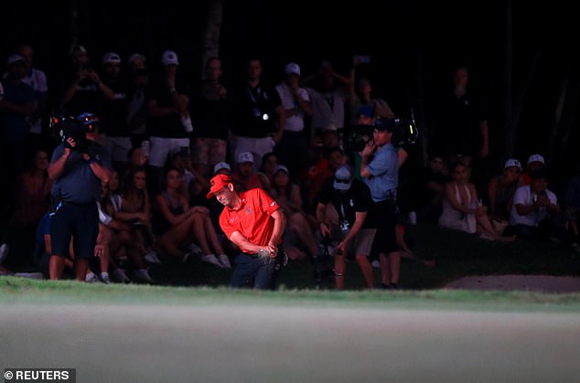 The 18th green was barely lit by just the giant screen on the final hole of the play-off