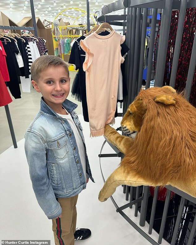 Hunter and his mother Roxy wore a $1,608 Amiri denim jacket and $2,350 Gucci track pants during his window shopping outing, making their first stop at designer store Louis Vuitton