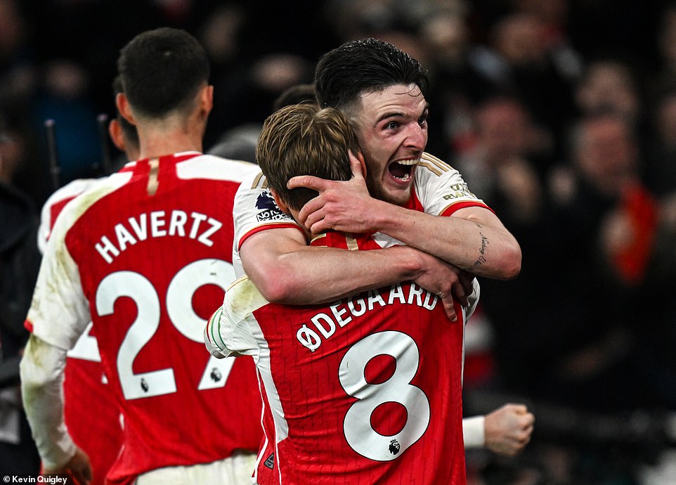 Declan Rice and Martin Odegaard went into delirium after Arsenal won and kept their Premier League title dream alive