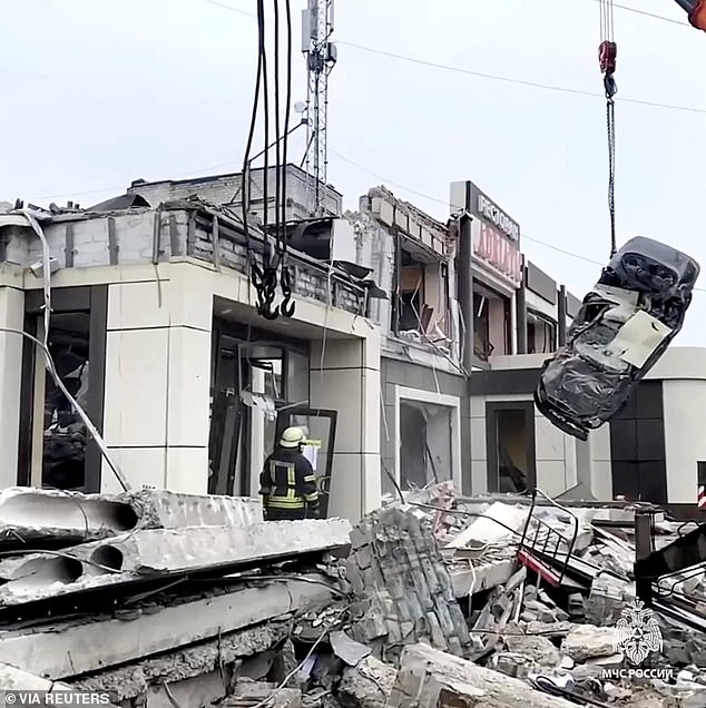 Moscow's occupation forces said on Saturday that Kiev hit a building (pictured) that housed a bakery popular with locals on weekends