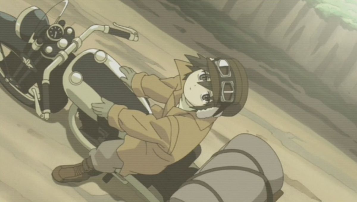 An overhead shot of a brown-haired anime kid wearing a cap and goggles, sitting on a motorcycle and staring at the sky.