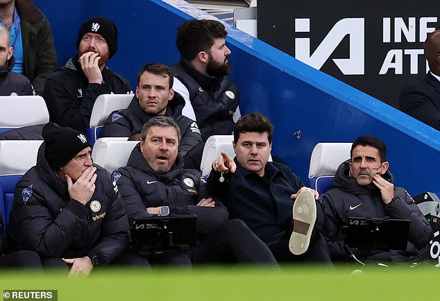 It would cost Chelsea more than £10m to sack the manager and his large backroom team (L-R: Toni Jimenez, Miguel D'Agostino, Pochettino and assistant manager Jesus Perez)