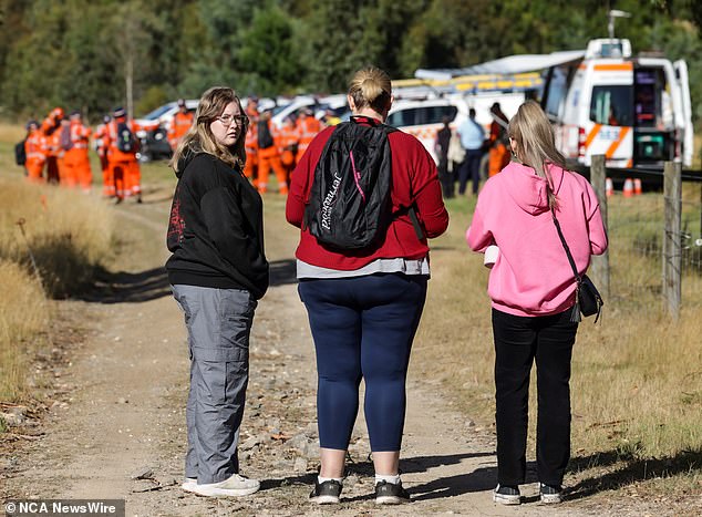 Friends of Ms Murphy are seen joining the search in Ballarat East