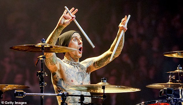 blink-182 last toured Down Under in 2013, but Travis did not join the band due to his fear of flying, which stemmed from being a passenger in a plane crash (Travis is pictured in May)