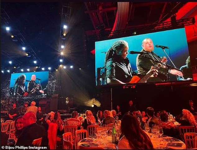 Bijou also gave followers a little glimpse into the annual celebration, sharing an interior photo of the event on big screens showing Tracy Chapman's surprise Grammy performance.