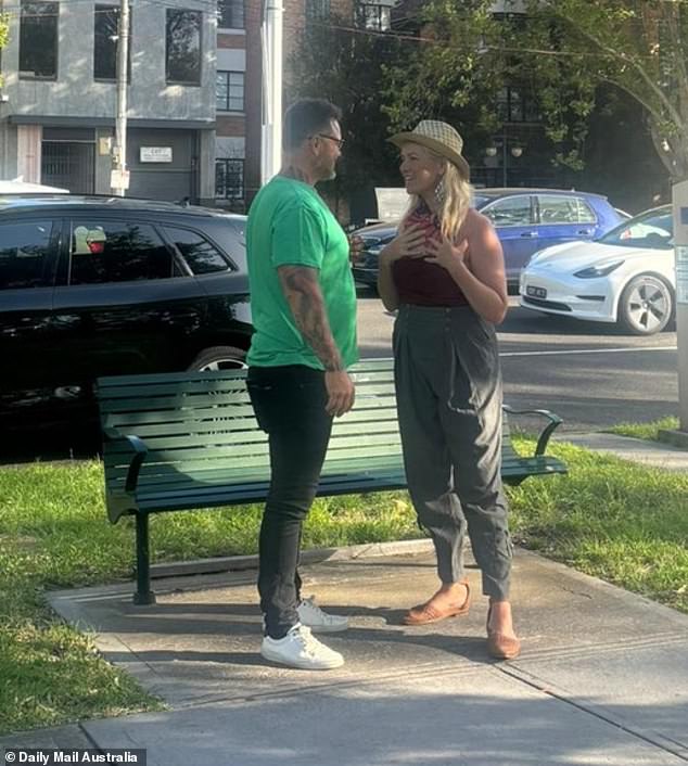 At one point, the couple was photographed deep in conversation in the middle of the street