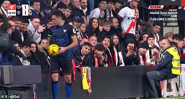 Ocampos turned to the fan and exchanged words with him before the referee intervened