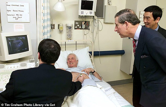 Cancer charities are now rallying behind the monarch following his shock diagnosis.  He is seen next to patient Stephen White as he receives a liver scan at the University Hospital in Liverpool