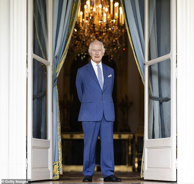 Buckingham Palace released this photo of King Charles last night as it emerged the monarch had been diagnosed with cancer