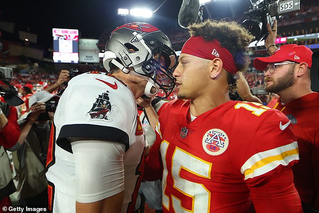 Brady and Mahomes shake hands after playing a regular season game in 2022