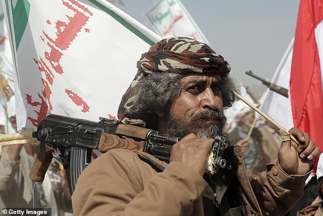 A Houthi participates in a rally in support of Palestinians in the Gaza Strip, and the recent Houthi attacks on shipping in the Red Sea and Gulf of Aden on February 4, 2024, on the outskirts of Sana'a, Yemen