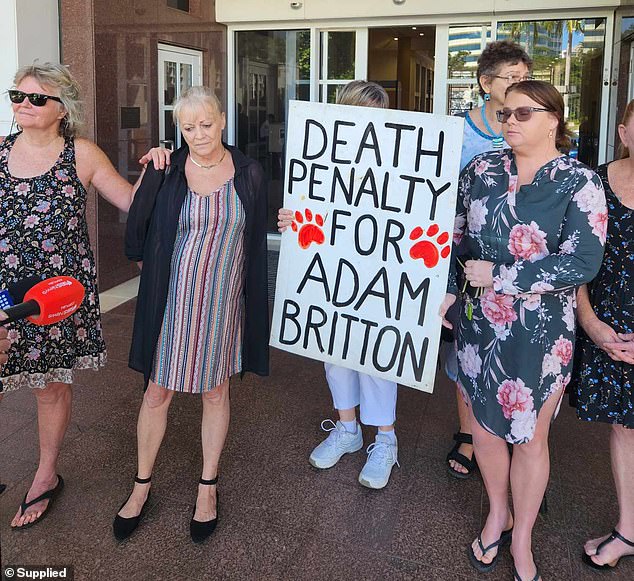 Animal activists outside the Darwin High Court on Tuesday (pictured) demanded Britton be sentenced to life behind bars