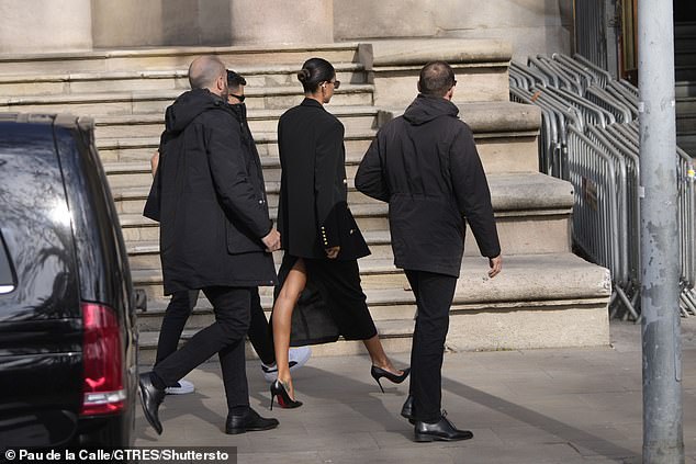 Joana San, Alves' wife, walked into the Barcelona courtroom today to testify