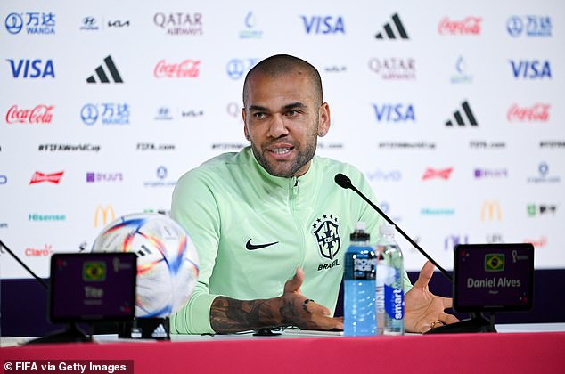 Dani Alves speaks at a press conference during the World Cup in Qatar on December 1, 2022