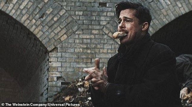 The actor is seen here eating a baguette in Inglourious Basterds (2009)