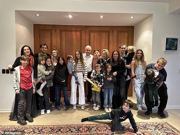 Pinera is seen in July with his children and grandchildren, in a photo with the caption: 