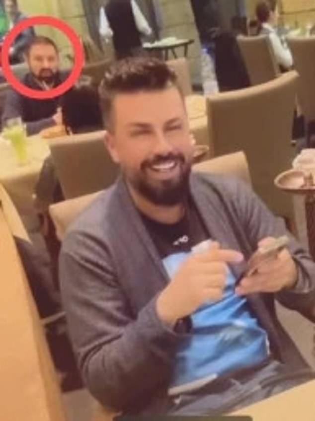 Jean Nassif (circled) was seen eating at a food court in a Lebanese shopping center after fleeing abroad in the aftermath of the massive crash of his development company Toplace