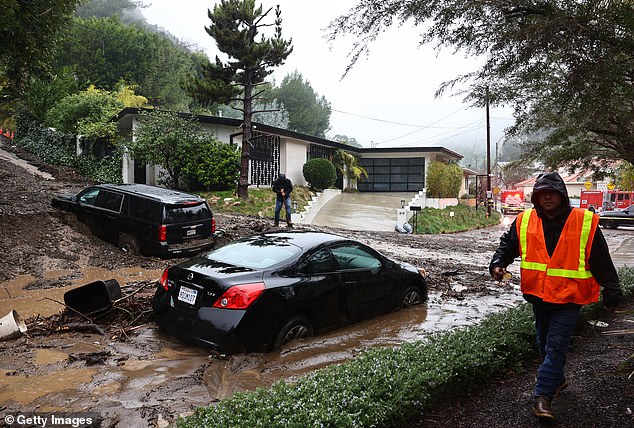 Meanwhile, 130 miles along the coast in San Diego, roads turned into rivers and officials warned residents not to drive to work Tuesday morning