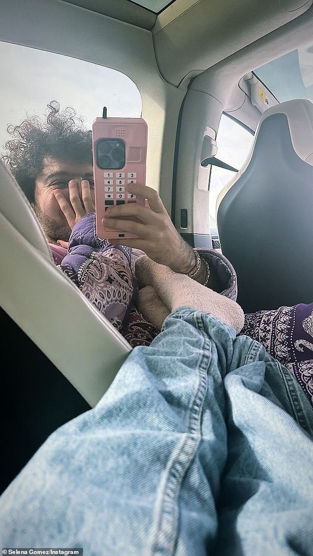 Gomez shared on her social media page on Tuesday a photo taken while she lay back in a car with her feet on Blanco's chest.