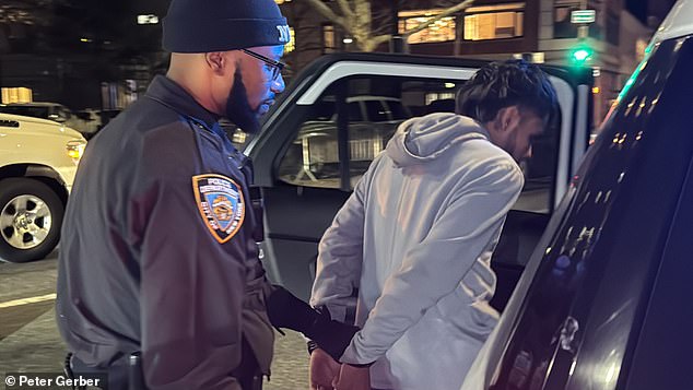 Two of the migrants, Andrade Cleyber, 20, and Juan Uzcatgui, 23, were seen leaving the First Precinct in Manhattan on Monday.  Cleyber was charged with 25 counts of grand larceny and Uzcatugi was charged with 20