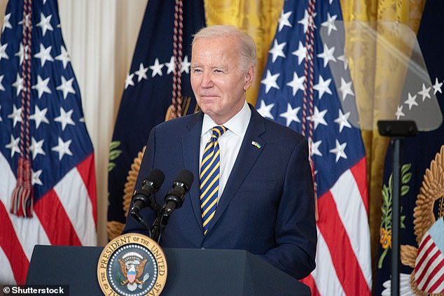 Lichtman said Biden, pictured on Tuesday, currently has a lead over Trump - despite the polls