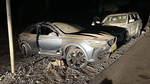 The burned-out car Romi was driving on October 7