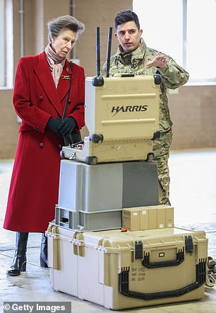 Anne speaks and sees a demonstration with an explosives disposal robot