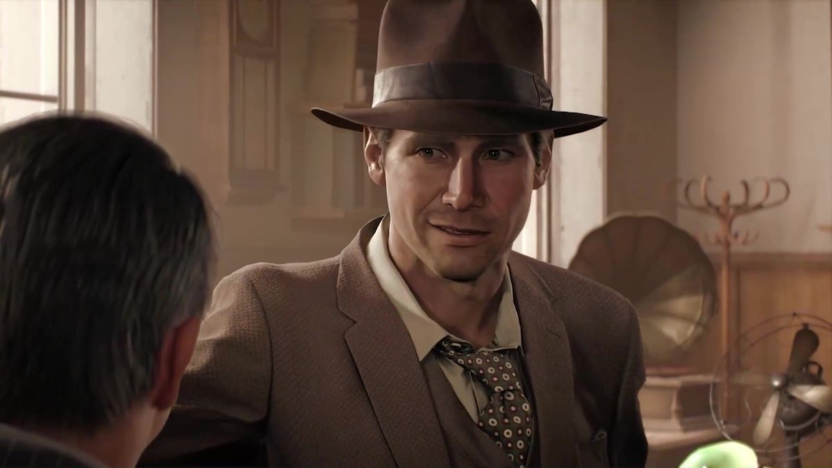 Indiana Jones, dressed in a brown suit and his classic fedora, grins at someone