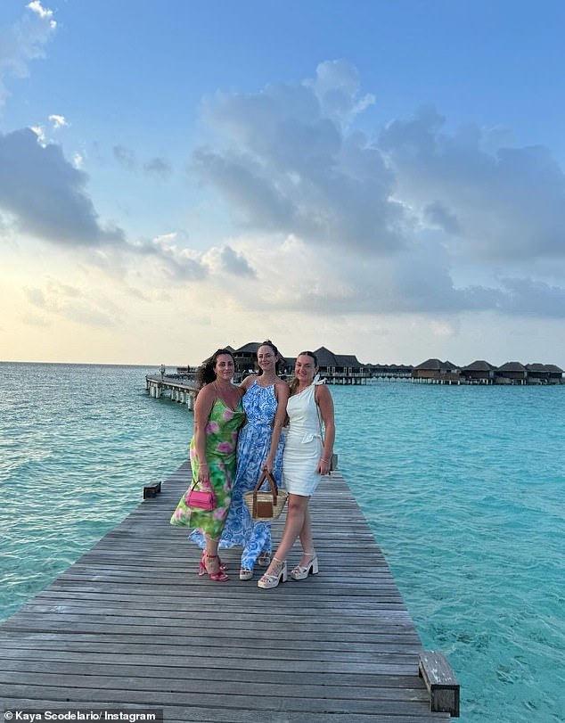 She has since jetted off to a sun-soaked trip to the Maldives with a group of friends, sharing a photo of the trio posing by the clear sea on Tuesday.